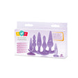 Try Curious 6 Piece Anal Plug Kit Purple displayed in packaging with various sizes and shapes for backdoor exploration.