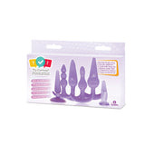 Try Curious 6 Piece Anal Plug Kit Purple displayed in packaging with various sizes and shapes for backdoor exploration.