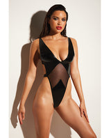 FETISH Limitless High Leg Vinyl Mesh Teddy Black L XL showcased on a model, highlighting its daring design and body-hugging silhouette.