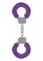 Ouch Beginner's Handcuffs Furry Purple with plush fur lining for comfort and playful restraint in the bedroom.