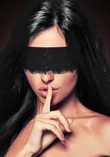Ouch Mystere Lace Eye Mask Blindfold Black displayed on a model expressing mystery and allure.