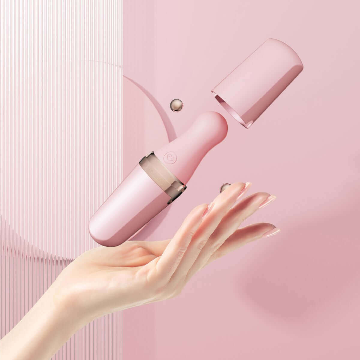Hand holding the Sweet Secret Massager Pink with cap removed, showcasing its sleek design for dual clitoral suction and wand vibration.
