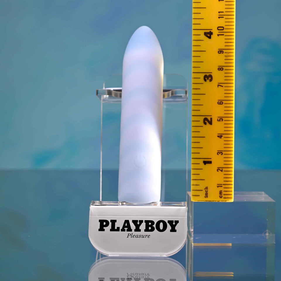 Playboy Unicorn Vibes Silicone Vibrating Bullet Blue on display with a ruler for size reference.