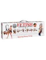 Fetish Fantasy Spinning Fantasy Swing Black packaging with adjustable nylon straps and images of couples enjoying it.