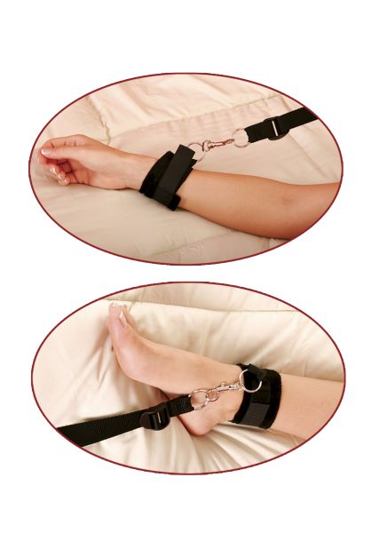 Fetish Fantasy Bed Bindings Restraint Kit showcasing wrist and ankle straps on a bed.
