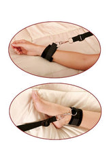 Fetish Fantasy Bed Bindings Restraint Kit showcasing wrist and ankle straps on a bed.