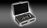 Pipedream Metal Worx Steel Cock Cage displayed in a sleek chrome case, showcasing luxury and elegance.