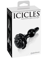 Icicles No 77 Hand Blown Glass Rose Butt Plug Black packaging display with elegant design.