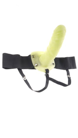 Fetish Fantasy Strap On For Him Or Her Glow In The Dark with a black harness and a glow in the dark dildo.