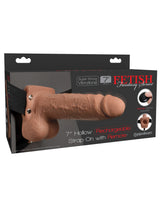 Fetish Fantasy 7 Inch Hollow Strap-On Remote Tan packaging displaying lifelike dildo and harness features.