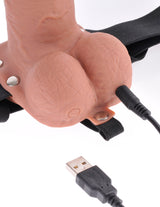 Fetish Fantasy 7 Inch Hollow Strap-On Remote Tan close-up with USB connection and elastic harness.