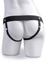Fetish Fantasy 7.5 Inch Hollow Squirting Strap-On Tan displayed on a mannequin's backside, showcasing the design and fit.
