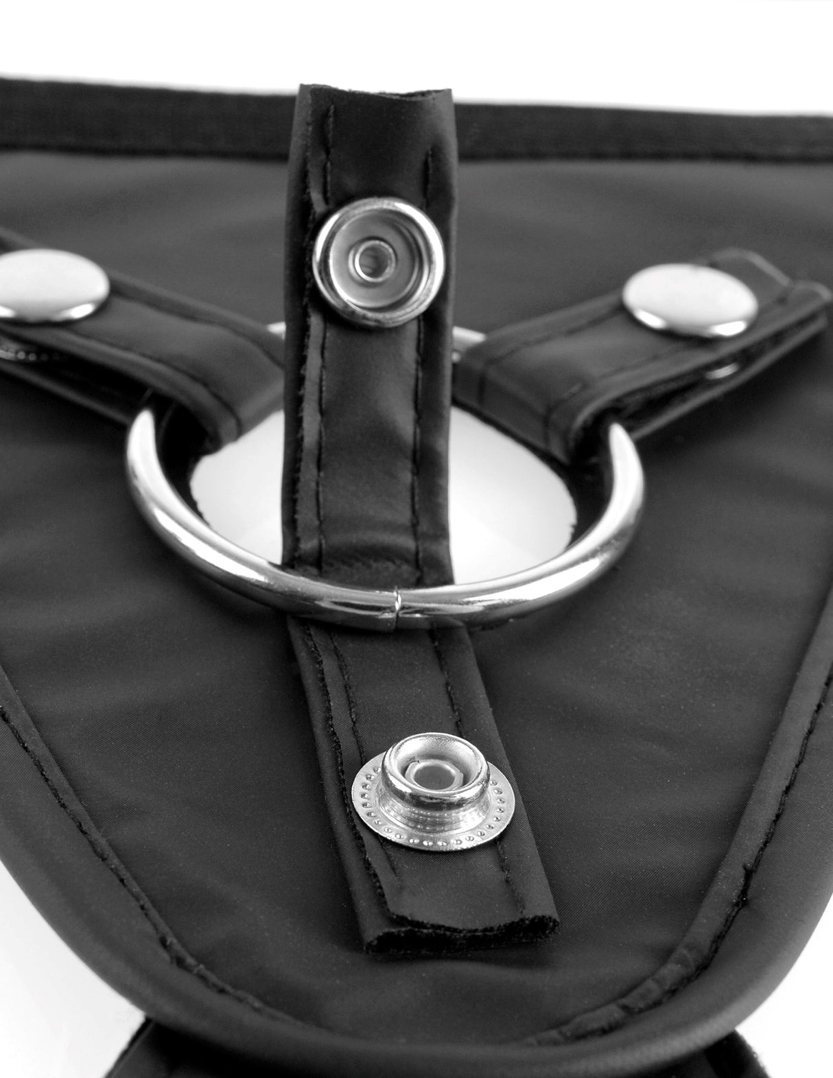 Detail of the Fetish Fantasy Perfect Fit Adjustable Harness Black showing the adjustable straps and metal ring.