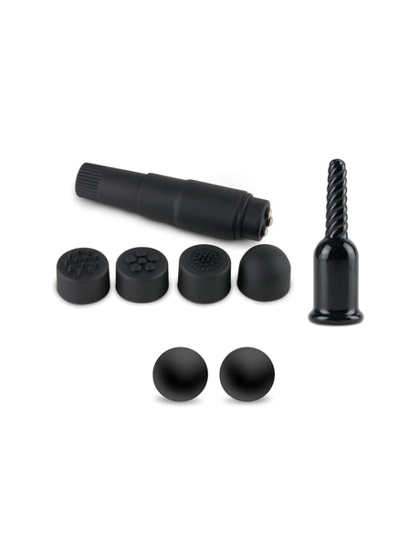 Fetish Fantasy Limited Edition Ultimate Bondage Kit components including a massager and various attachments in black.