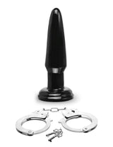 Fetish Fantasy Limited Edition Ultimate Bondage Kit includes a black plug and handcuffs for bondage play.