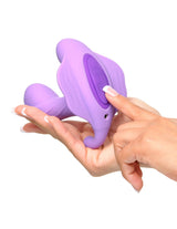 Fantasy For Her G-Spot Stimulate-Her Vibrator Purple in hand, showcasing its dual motors and ergonomic design.