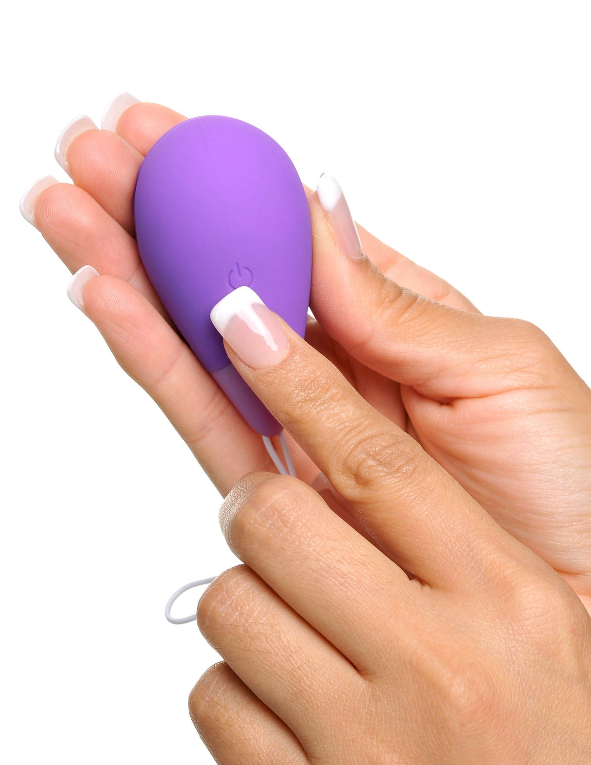 Fantasy For Her Remote Kegel Excite-Her Purple being held in hand, showcasing sleek design and control button.