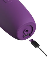 Close-up of the charging port of the Fantasy For Her Luxe Thrust Vibrator Purple with USB cable.