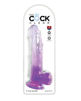 King Cock Clear 9 inches Cock with Balls Purple displayed in packaging showcasing its lifelike design and translucent style.