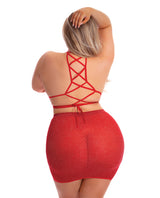 Back view of a model wearing the Pink Lipstick Midnight Sun Skirt Set Red Queen, showcasing its strappy design and fitted skirt.