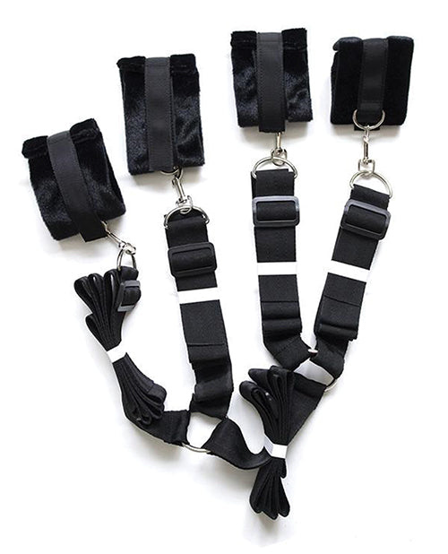 Plesur Fuzzy Bedroom Bondage Kit Black showing fuzzy cuffs and connection straps for secure restraint play.