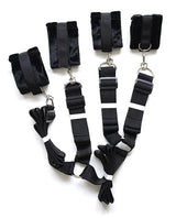 Plesur Fuzzy Bedroom Bondage Kit Black showing fuzzy cuffs and connection straps for secure restraint play.