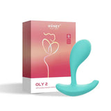 Oly 2 App-Enabled Wearable Vibrator Blue next to its packaging, showcasing a sleek design for intimate pleasure.