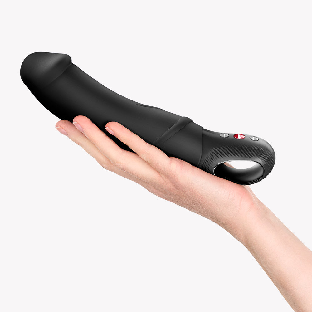 Fun Factory Big Boss G-Spot Vibrator Black held in hand, showcasing its sleek design and multiple control features.