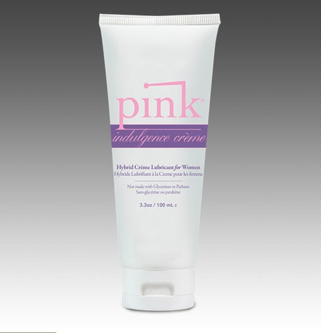 Pink Indulgence Hybrid Creme Lubricant 3.3 Oz tube on a gradient background.