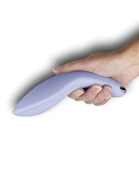 Niya 2 Cornflower Couples Massager Vibrator held in hand, showcasing soft silicone design.
