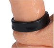 Rock Solid The O Ring Cock Ring Black secured around a realistic skin-tone model for enhanced pleasure.