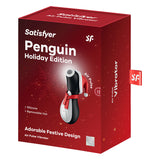 Satisfyer Penguin Holiday Edition Air Pulse Vibrator festive packaging with silicone material and removable hat.