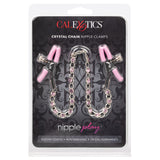Nipple Play Crystal Chain Nipple Clamps Pink in packaging featuring silicone coated clamps and crystal chain.