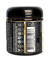 Sensuva Lit Champagne Luxury Massage Candle 4 Oz jar with ingredients and details on the label.