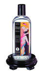 Shunga Personal Lubricant Natural Contact 4.4 Oz bottle displayed on a black stand, featuring colorful artwork.