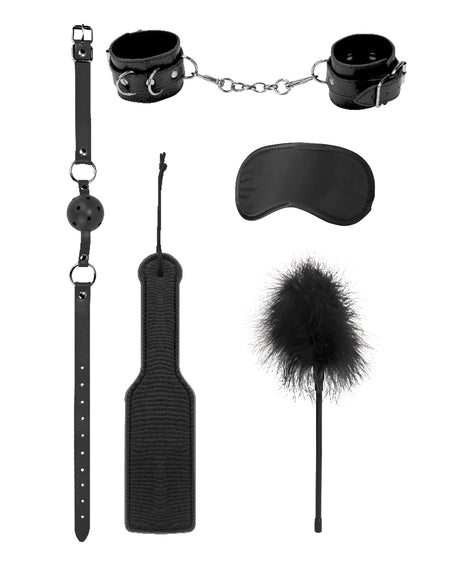 Shots Ouch Introductory Bondage Kit No 4 Black, featuring handcuffs, a ball gag, blindfold, paddle, and feather tickler.
