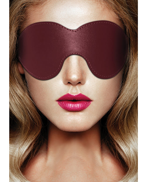 Shots Ouch Halo Eyemask Burgundy showcasing a luxurious burgundy leather look, enhancing sensory play.