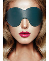 Shots Ouch Halo Leather Eyemask Blindfold Green on a model with blonde hair and bold lips.