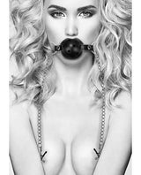 Ouch Breathable Ball Gag with Nipple Clamps Black worn by a model showcasing the product's design.
