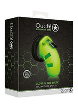 Ouch Model 20 Cock Cage 3.5 Inch Glow in the Dark Green packaging featuring a glowing silicone cock cage.