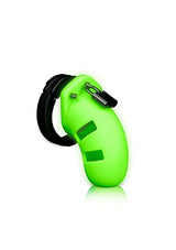 Ouch Model 20 Cock Cage 3.5 Inch Glow in the Dark Green with a secure design and vibrant fluorescent detailing.