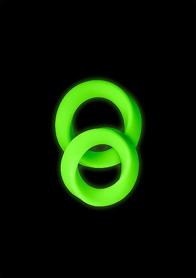 Glow 2pcs Cock Ring Set Glow In The Dark displayed against a dark background, showcasing the luminous green rings.