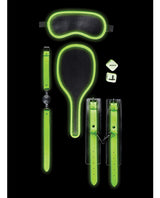 Shots Ouch Bondage Kit #1 Glow in the Dark featuring glowing restraints, blindfold, and paddles for adventurous experiences.