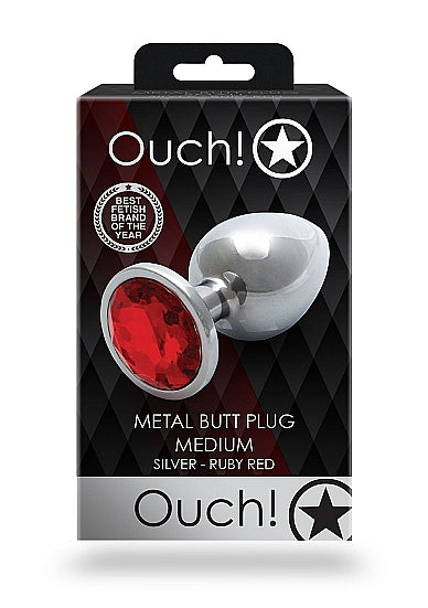 Round Gem Butt Plug Medium Silver Ruby Red in packaging by Ouch!, featuring a sleek design with a jewel at the base.
