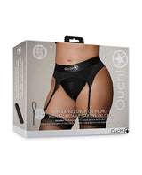 Ouch Vibrating Strap-On Thong with Garters Black XL XXL packaging displayed with adjustable garters