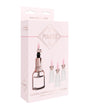 Shots Pumped Clitoral & Nipple Pump Set Medium Rose Gold packaging featuring a hand pump and clear cylinders.