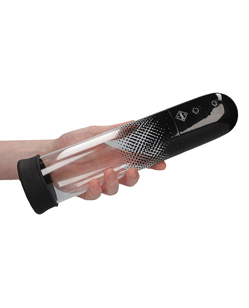 Pumped Automatic Luv Pump Black held in hand, showcasing its ergonomic design and controls for easy use.