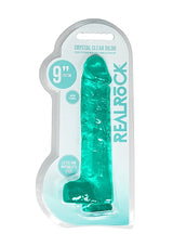 Realrock 9 Inch Realistic Dildo With Balls Turquoise in crystal-clear packaging.