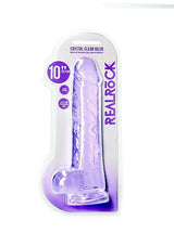 Realrock Realistic Dildo with Balls 10 inch Purple in packaging, featuring a veined shaft and suction cup base.