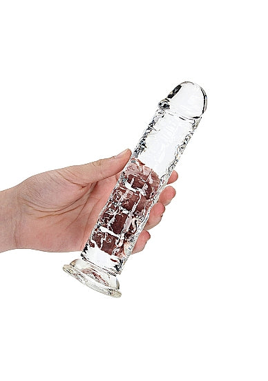 Realrock Straight Realistic 8 Inch Dildo Transparent held in hand, showcasing its transparent design and realistic shape.
